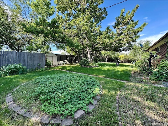 10425 Franklin Way, Northglenn, CO 80233 - view of yard featuring a storage shed