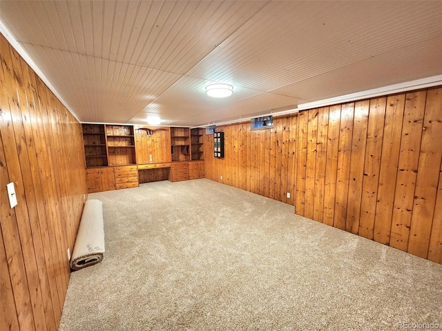 18 Columbia Dr, Julesburg, CO 80737 - finished basement featuring wooden walls, carpet flooring, and wooden ceiling