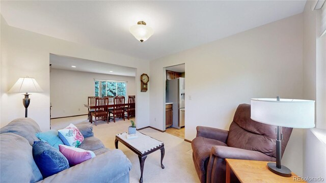 7865 S Lafayette Ct, Centennial, CO 80122 - living room featuring light colored carpet and baseboards