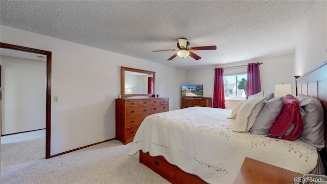 7865 S Lafayette Ct, Centennial, CO 80122 - bedroom featuring light colored carpet, ceiling fan, and a textured ceiling