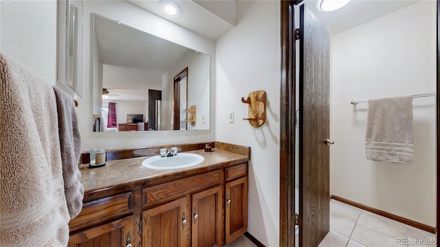 7865 S Lafayette Ct, Centennial, CO 80122 - bathroom featuring tile patterned flooring, vanity, and a ceiling fan