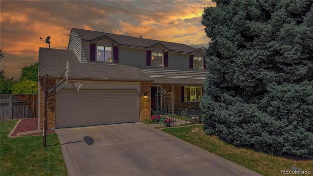 7865 S Lafayette Ct, Centennial, CO 80122 - traditional-style home featuring brick siding, an attached garage, concrete driveway, and roof with shingles