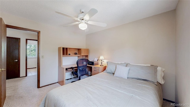 7865 S Lafayette Ct, Centennial, CO 80122 - bedroom with light carpet, ceiling fan, and a desk