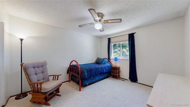 7865 S Lafayette Ct, Centennial, CO 80122 - bedroom with carpet, ceiling fan, and a textured ceiling