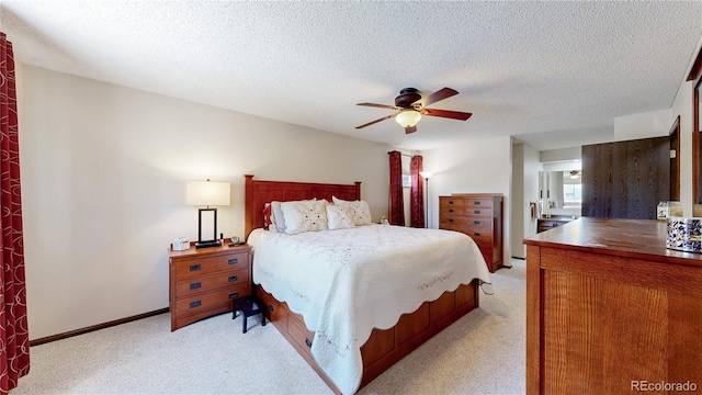 7865 S Lafayette Ct, Centennial, CO 80122 - bedroom with light colored carpet, a ceiling fan, and a textured ceiling
