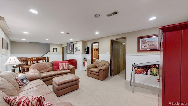 7865 S Lafayette Ct, Centennial, CO 80122 - living room featuring light colored carpet, recessed lighting, and wainscoting