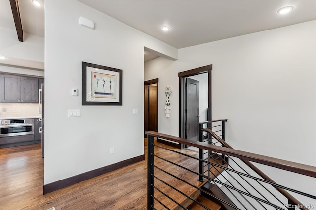 14 E Baron Way, Silverthorne, CO 80498 - corridor with an upstairs landing, wood finished floors, recessed lighting, and beamed ceiling