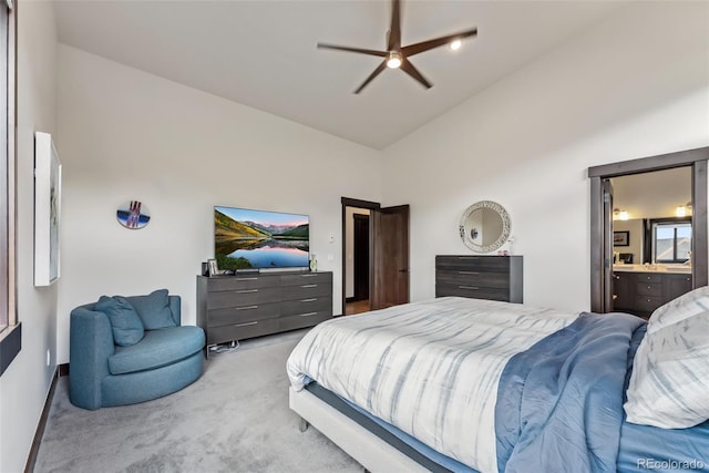 14 E Baron Way, Silverthorne, CO 80498 - bedroom with carpet floors, high vaulted ceiling, ensuite bathroom, and ceiling fan