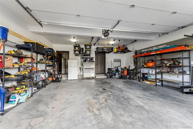 14 E Baron Way, Silverthorne, CO 80498 - garage featuring freestanding refrigerator and water heater