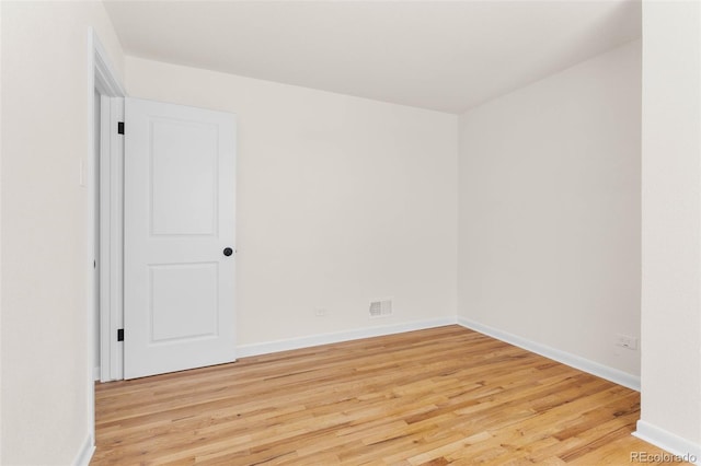 7555 E 22nd Ave, Denver, CO 80207 - unfurnished room featuring light wood-type flooring and baseboards