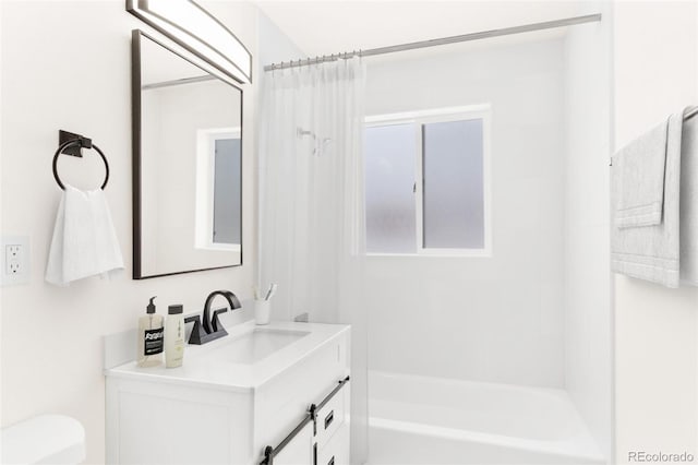 7555 E 22nd Ave, Denver, CO 80207 - full bath with vanity, toilet, and shower / bath combo with shower curtain