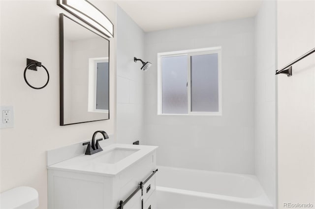 7555 E 22nd Ave, Denver, CO 80207 - bathroom with vanity, toilet, and washtub / shower combination