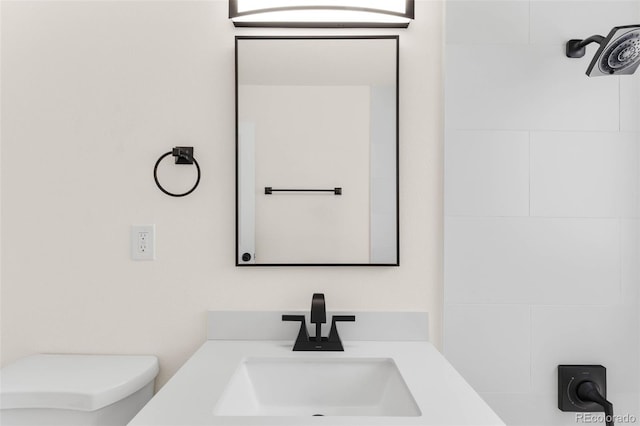 7555 E 22nd Ave, Denver, CO 80207 - bathroom with toilet and vanity