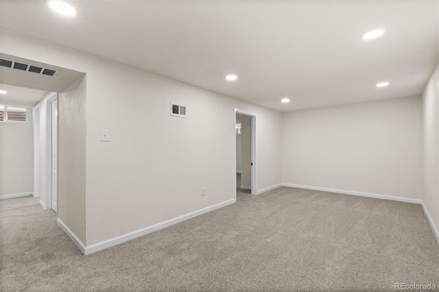7555 E 22nd Ave, Denver, CO 80207 - spare room featuring light carpet, recessed lighting, and baseboards