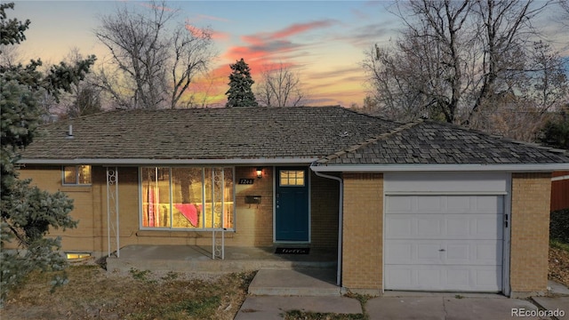 ranch-style house with a garage