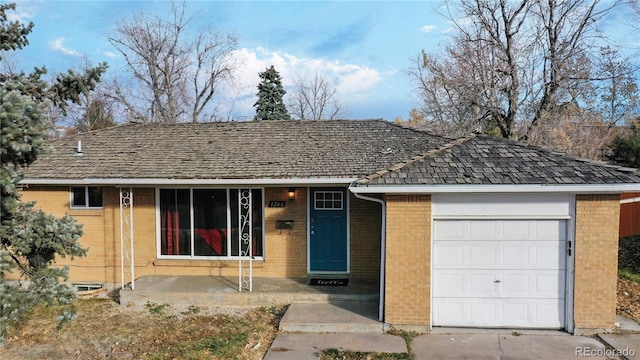 single story home featuring a garage