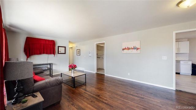 living room featuring dark hardwood / wood-style floors