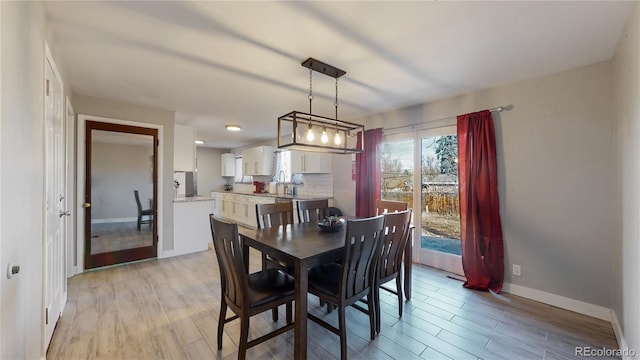 dining room featuring light hardwood / wood-style flooring