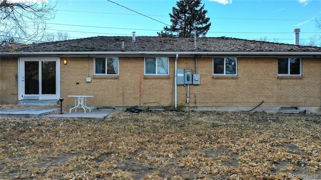 rear view of house with a patio