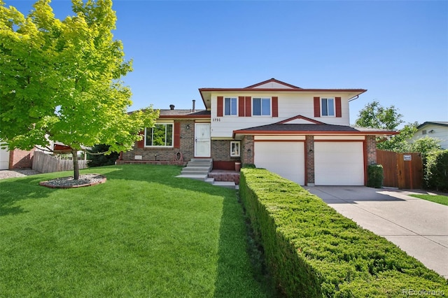 1791 S Laredo St, Aurora, CO 80017 - split level home featuring brick siding and concrete driveway