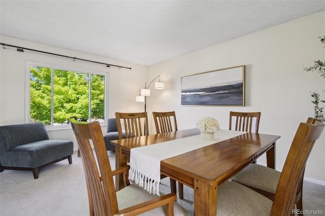 1791 S Laredo St, Aurora, CO 80017 - dining area featuring light colored carpet