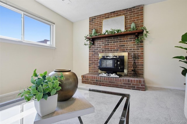 1791 S Laredo St, Aurora, CO 80017 - carpeted living room with baseboards and a wood stove