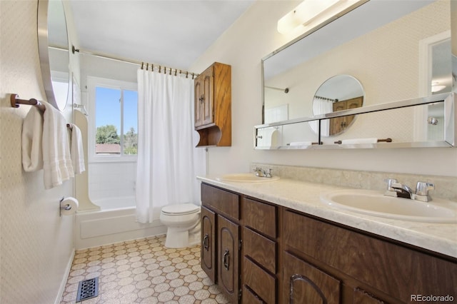 1791 S Laredo St, Aurora, CO 80017 - bathroom featuring double vanity, shower / bath combo, and tile patterned floors