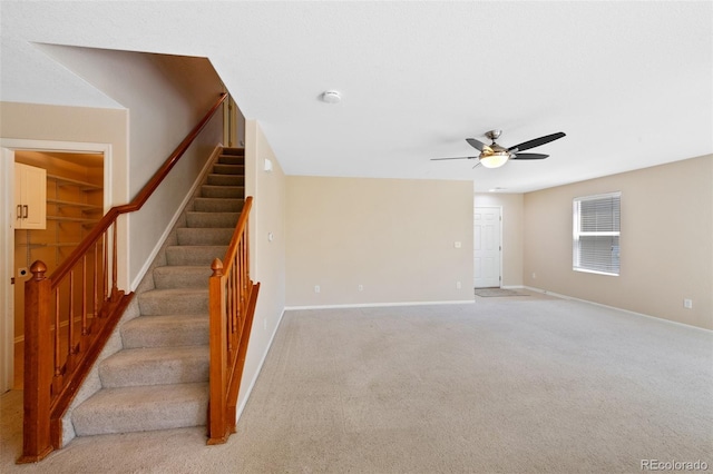 16256 E Otero Pl, Englewood, CO 80112 - stairway with ceiling fan, baseboards, and carpet floors