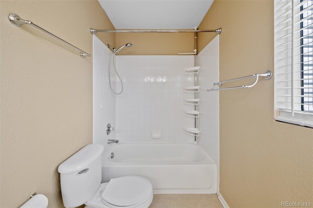 16256 E Otero Pl, Englewood, CO 80112 - bathroom featuring toilet,  shower combination, tile patterned flooring, and baseboards