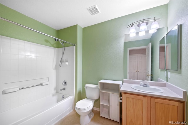 16256 E Otero Pl, Englewood, CO 80112 - full bathroom with a textured wall, toilet, vanity, tile patterned floors, and shower / bathtub combination