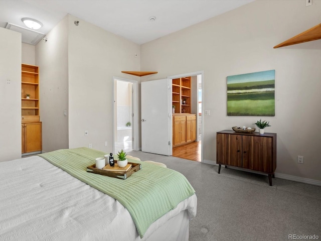 225 N Lincoln St Unit 4, Denver, CO 80203 - bedroom featuring a spacious closet, ensuite bathroom, and carpet flooring
