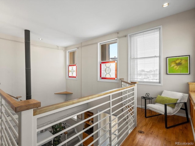 225 N Lincoln St Unit 4, Denver, CO 80203 - hall featuring hardwood / wood-style floors, recessed lighting, and an upstairs landing