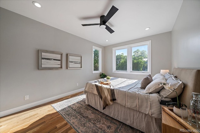 5838 S Louthan St, Littleton, CO 80120 - bedroom with wood finished floors, recessed lighting, and a ceiling fan