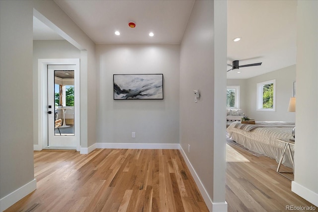 5838 S Louthan St, Littleton, CO 80120 - hall with light wood-type flooring, plenty of natural light, and recessed lighting