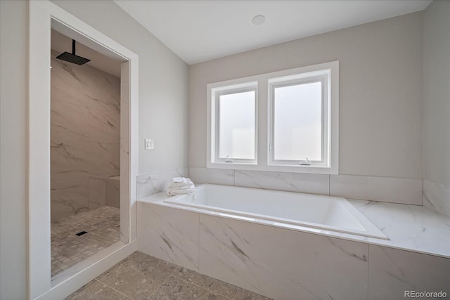 5838 S Louthan St, Littleton, CO 80120 - full bathroom with a bath and a marble finish shower
