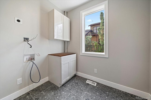 5838 S Louthan St, Littleton, CO 80120 - washroom featuring hookup for an electric dryer, washer hookup, and cabinet space