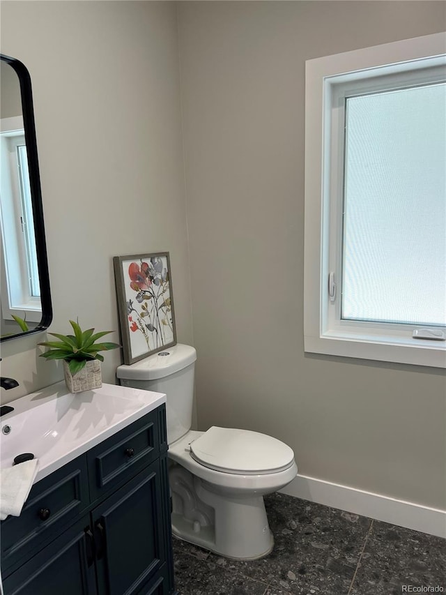 5838 S Louthan St, Littleton, CO 80120 - half bathroom with vanity and toilet