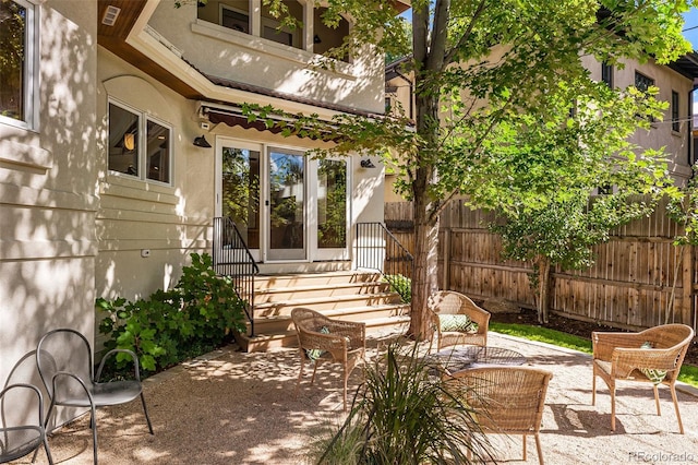 view of patio / terrace featuring fence