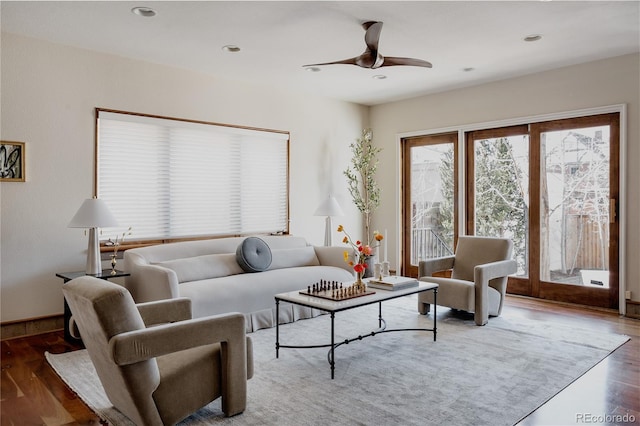 living room featuring recessed lighting, wood finished floors, and a ceiling fan