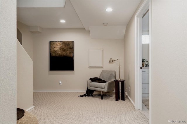 living area featuring recessed lighting, baseboards, and carpet floors