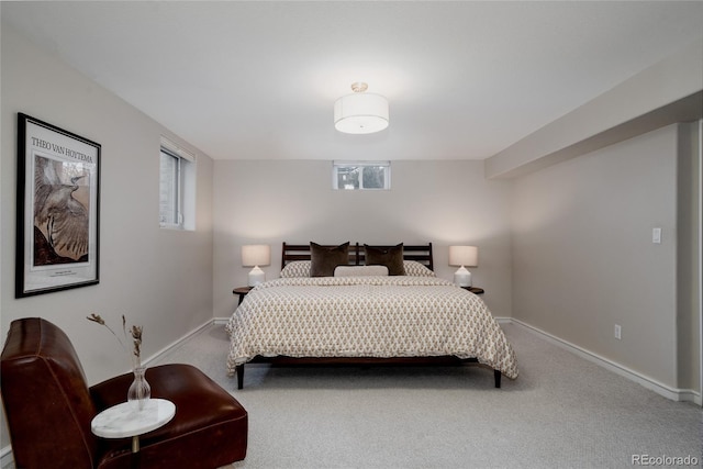 carpeted bedroom with baseboards