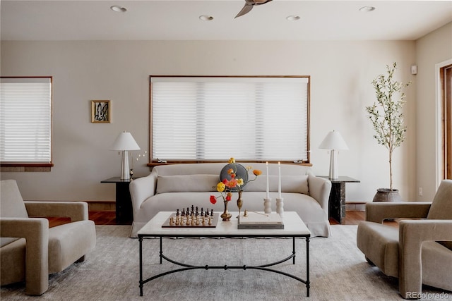 living room featuring recessed lighting, ceiling fan, and wood finished floors