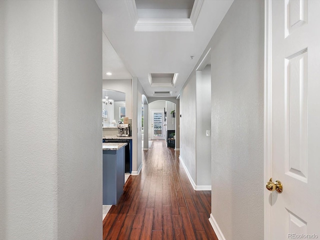 1747 N Pearl St Unit 306, Denver, CO 80203 - hall featuring a raised ceiling, arched walkways, dark wood finished floors, baseboards, and recessed lighting