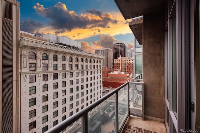 view of balcony at dusk