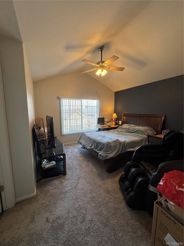 bedroom featuring a textured ceiling, ceiling fan, carpet, and lofted ceiling