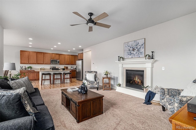 living room featuring ceiling fan