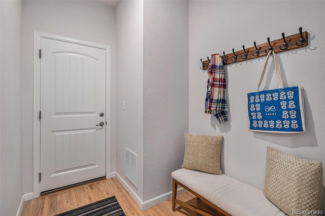 doorway to outside featuring hardwood / wood-style flooring