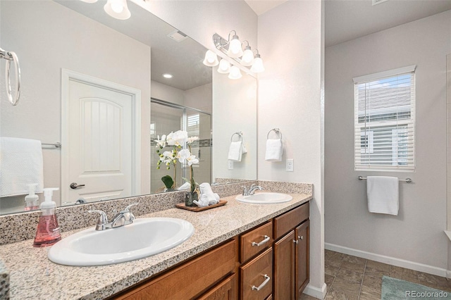 bathroom with vanity and walk in shower