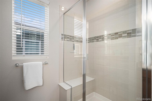 bathroom featuring walk in shower