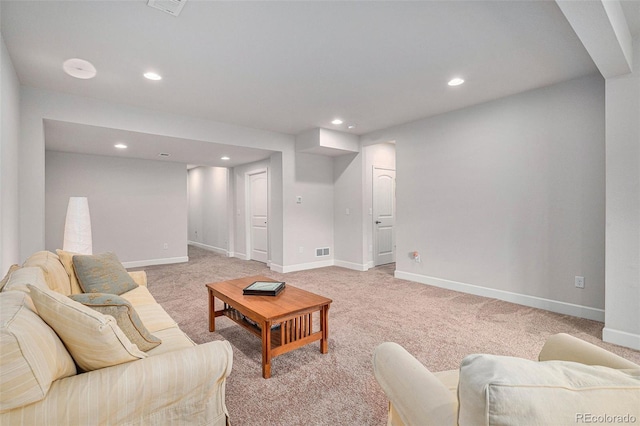 living room featuring light colored carpet